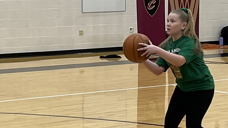 A student gets ready for a free throw shot.