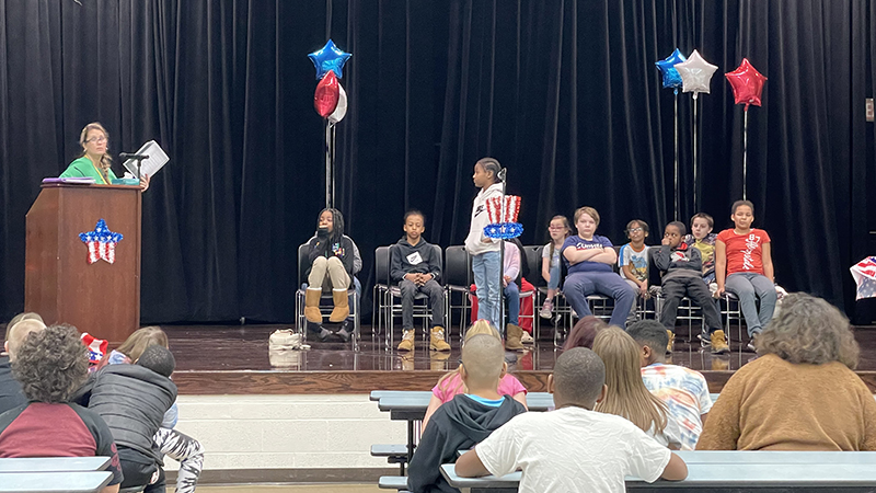 A student listens to his question.