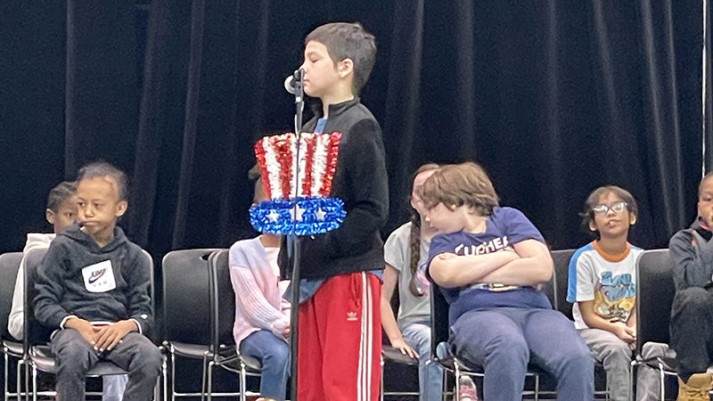 A student answers a question during the geography bee.