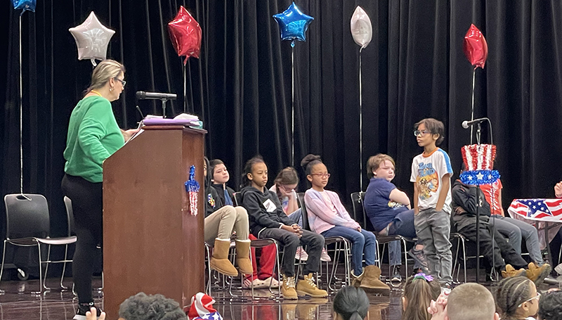 A student listens to his question.