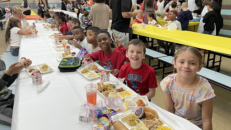 Second graders enjoying their lunch.