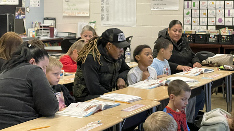 A student asks a question about the text.