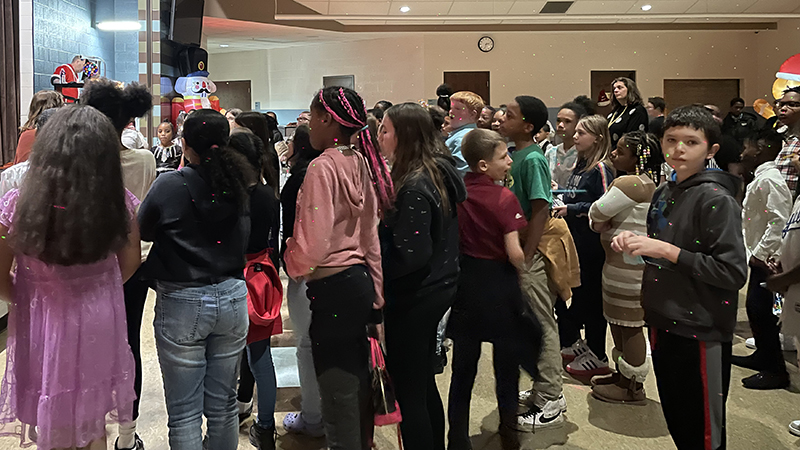 Students gather waiting for the king and queen to be announced.