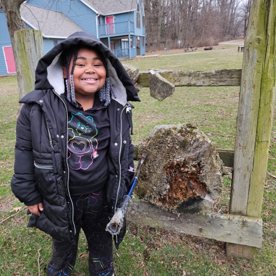 A fifth grade student enjoying the outdoor activities.