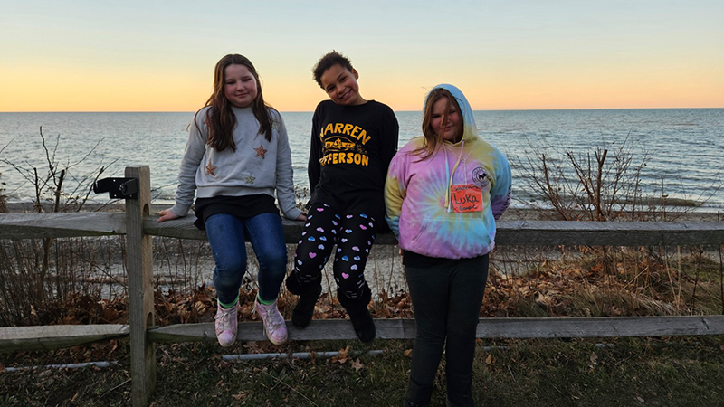 Fifth graders enjoying the sunset on Lake Erie.