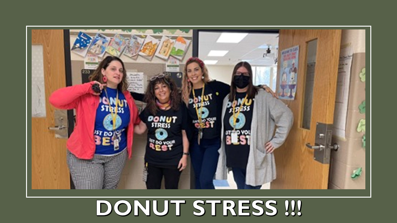 teachers standing in a row with matching tee shirts on that say "DONUT STRESS"
