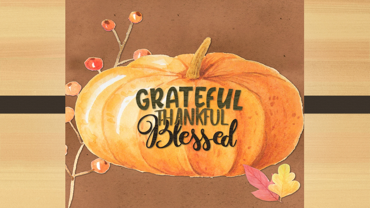 pumpkin with the word thankful grateful and blessed