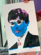 student created Andy Warhol image with blue face and purple in hair