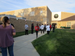 Men of Warren greeting our students on the first day of school.