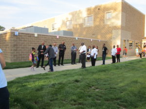 Men of Warren greeting our students on the first day of school.