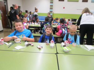 Kealen, Connor and Logan enjoying breakfast together.