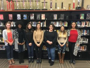 20/20 students inside the WGH Library