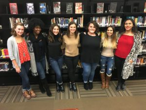 20/20 students inside the WGH Library