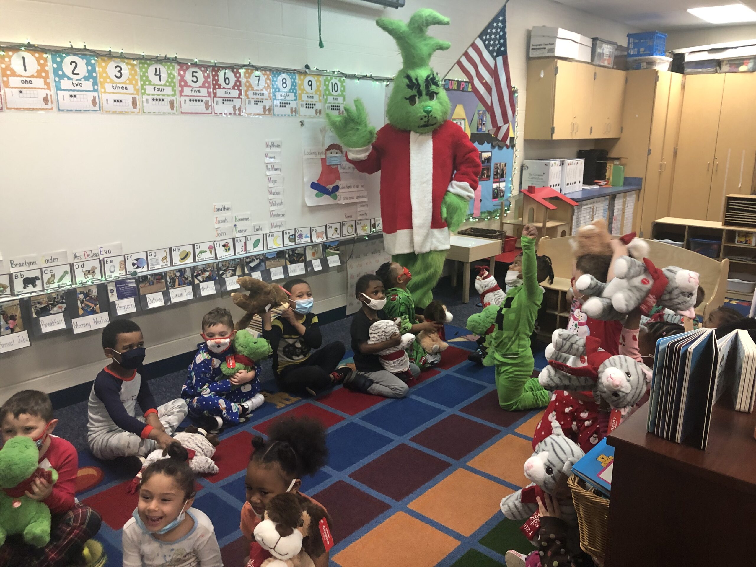 The Grinch delivers stuffed animals