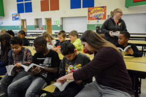 Associate Superintendent, Wendy Hartzell, with students after the Warren Rotary Club dictionary giveaway