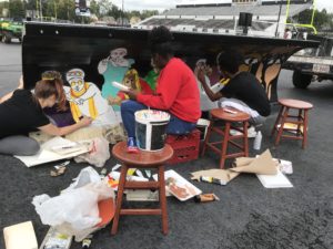 Students working on Paint a plow initiative from the Ohio department of Transportation