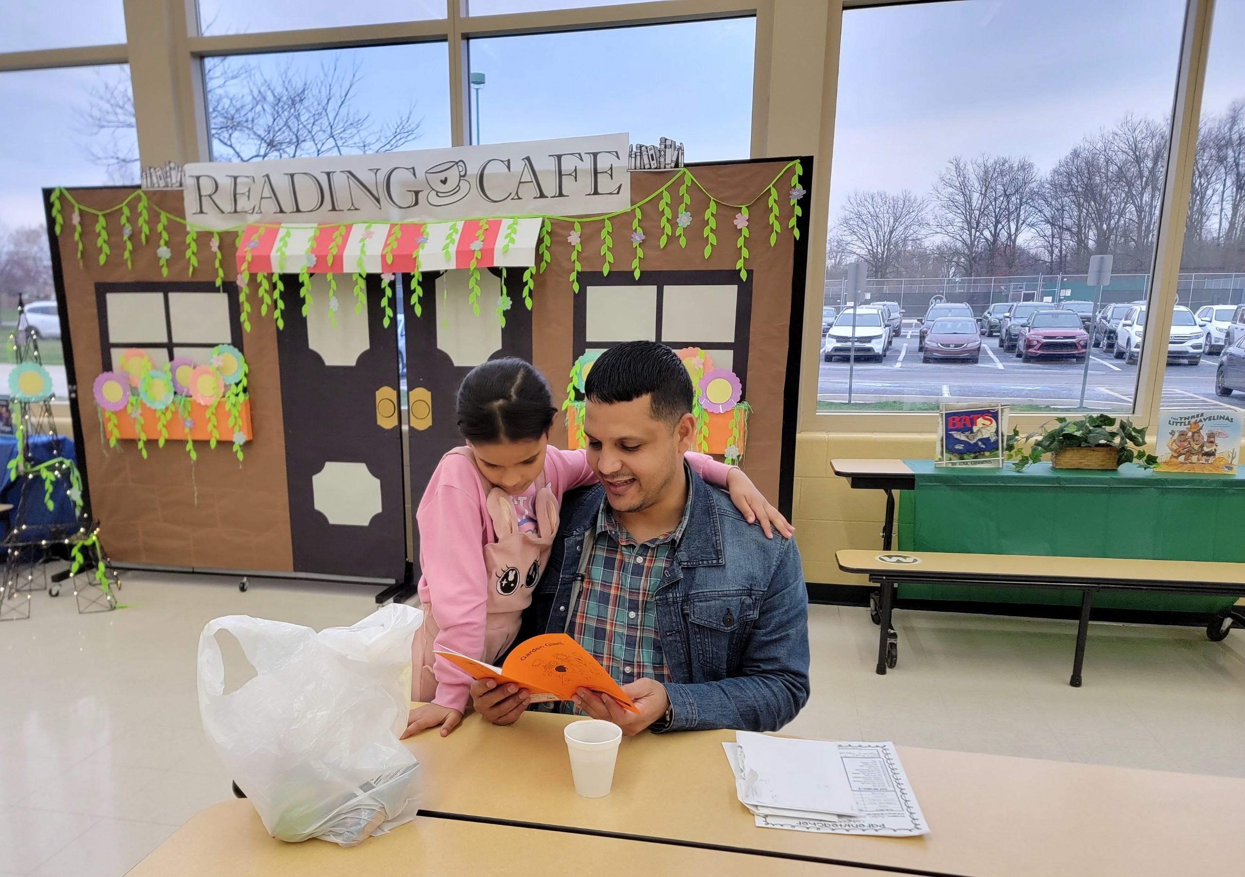Lincoln PK-8’s Reading Cafe  serves up some books & dinner to students & families