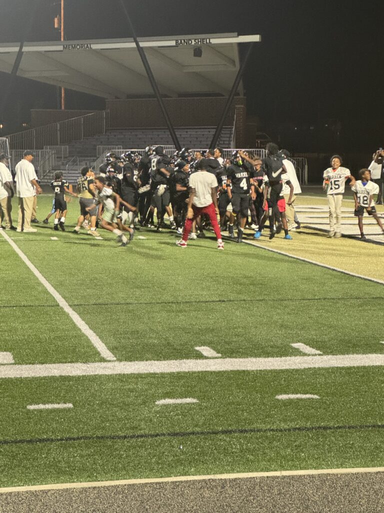 Players celebrating their big win after the game.