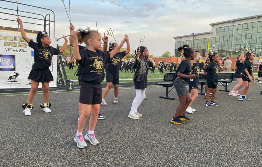 Students perform their dance routine.