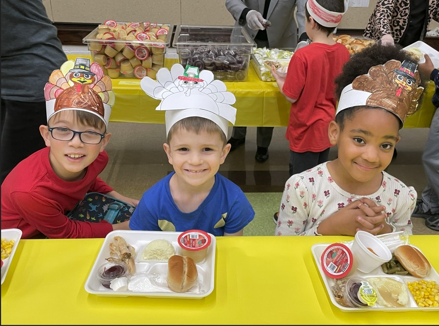 Students ready to enjoy lunch together.