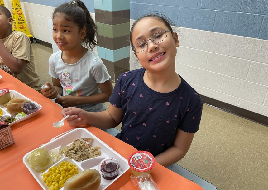 Students ready to enjoy lunch together.