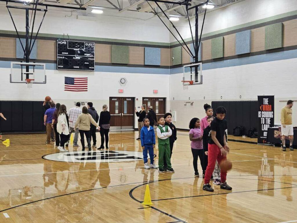Students line up to show their free throw skills