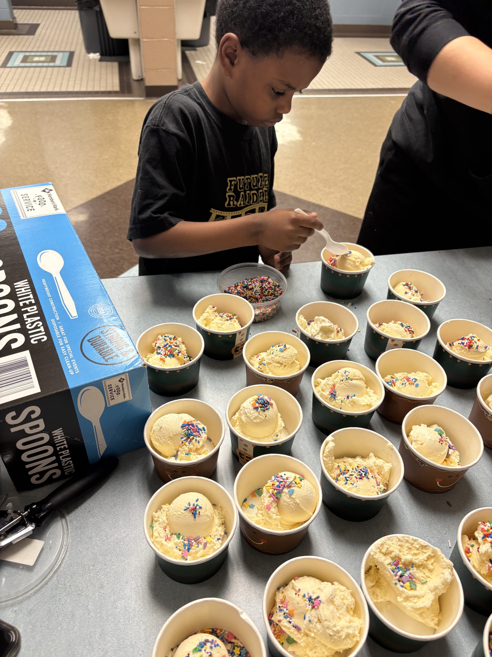 bowls of ice cream lined up ready for students to choose