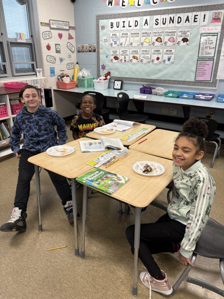 students enjoying their cake