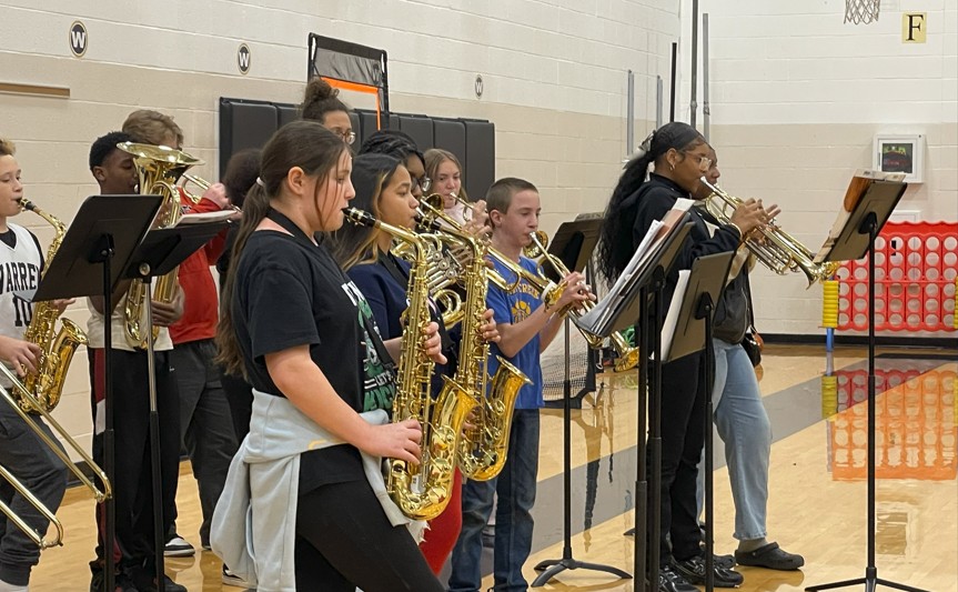 Band members participating in the pep rally