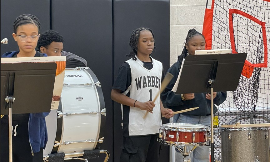 Percussion members playing for the pep rally