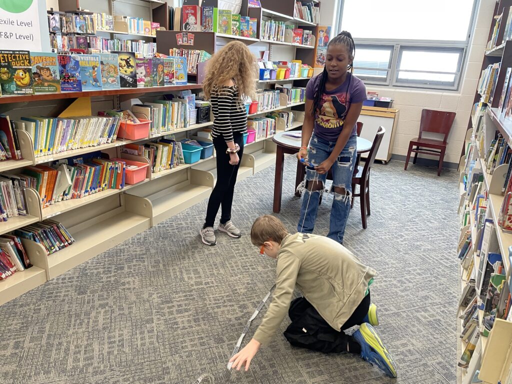 Students measure the distance