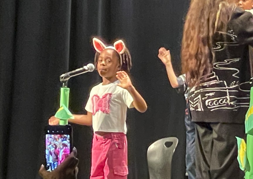 A soloist sings for the crowd