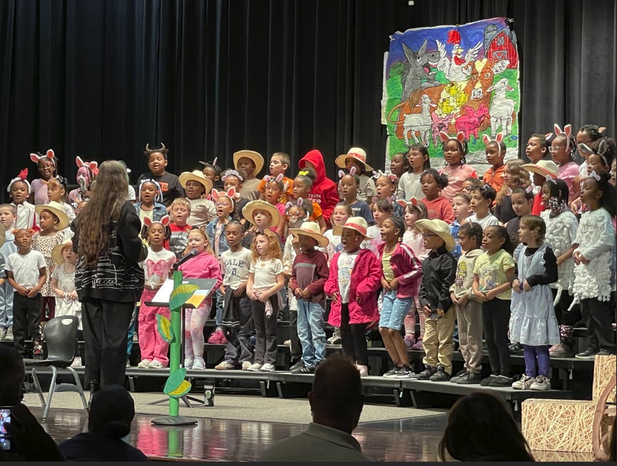 First grade on the stage performing