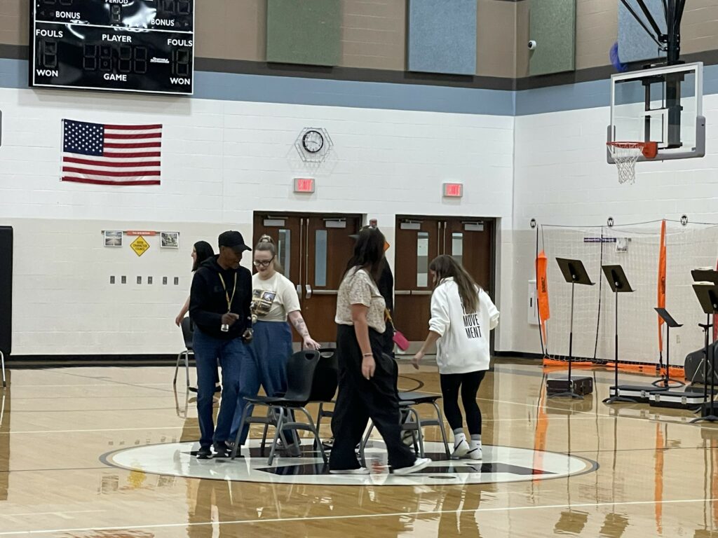 Staff compete in musical chairs